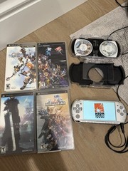 Sony PSP 3001 US Handheld Silver Console with games and case
