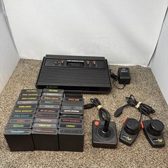 Atari 2600 System Bundle with Console, 30 Games, Joystick, Paddles, and More LOT