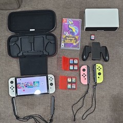 Nintendo Switch OLED 64GB With 9 Nintendo Switch Games, extra controller, + case
