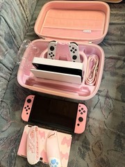 nintendo switch OLED white bundle w/ geekshare accessories & extra pink joycons
