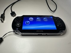 Sony PS Vita PCH-1101 Limited Edition Handheld System – Crystal Black With Game.
