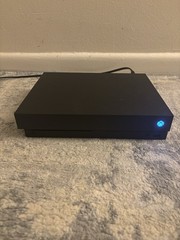 Microsoft Xbox One X 1TB – working- broken plastic on back.