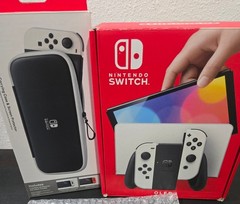 Nintendo – Switch OLED Handheld Console – 64GB Model *HOT BUNDLE*