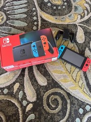 Nintendo Switch with everything still included works perfectly fine.