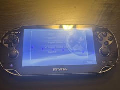 Sony PlayStation Vita 1000 + SD2vita + Charging Dongle + Memory Card + SD Card