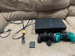 PlayStation 2 with 2 controllers and all necessary cords