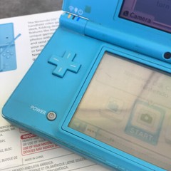 Nintendo DSi Light Blue Handheld Console w/Box, Nintendog, & Instruction Booklet