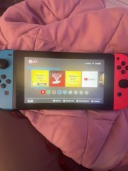 Nintendo Switch Console 32GB w/ Neon Red & Blue Joy-Con, Wi-Fi, 720p HD