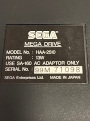 Mega Drive console HAA-2510, working condition, serial number matching.