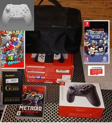 The most PRISTINE Nintendo Switch OLED bundle on eBay – 9 Item bundle