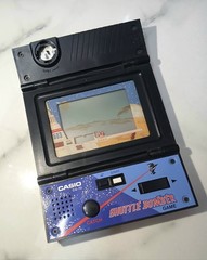 Vintage Casio Shuttle Bomber CG-70 Game & Radio Handheld System 1983