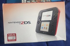 2ds console with 8 games ,box, Plastic Case, Everything Works