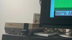 authentic NES Console Bundle with Super Mario Bros. 1,2,3 and 2 Controllers gun