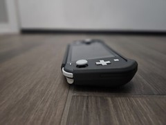 NINTENDO GREY SWITCH LITE, 240 GB storage, comes with matching case.