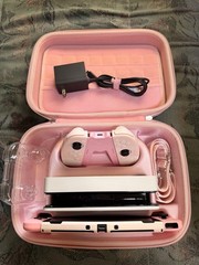 nintendo switch OLED white bundle w/ geekshare accessories & extra pink joycons