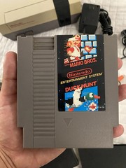 authentic NES Console Bundle with Super Mario Bros. 1,2,3 and 2 Controllers gun