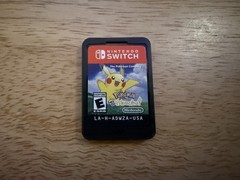 Nintendo Switch Console, Pro Controller, Pokémon: Let’s Go Pikachu