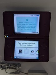 Nintendo DSi LL Burgundy Handheld Console With AC Adapter – working minor damage