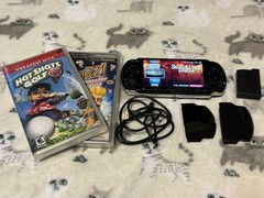 Sony PSP-3000 + Extended Battery + Charging Cable + Memory Card + 2 Sealed Games