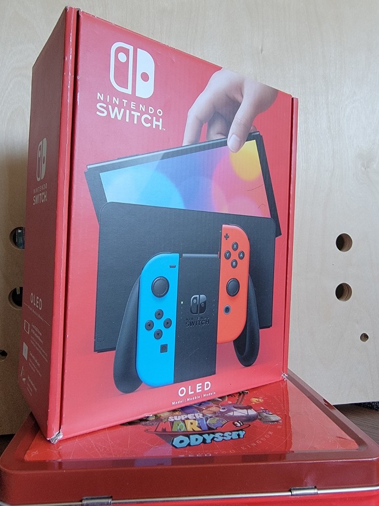 NEW IN BOX Nintendo Switch OLED Console – 64GB – Neon Blue/Neon Red Joycons