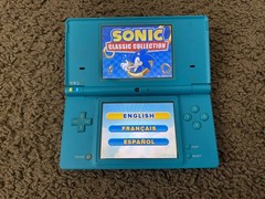 Nintendo DSi Handheld System Blue + Sonic Classic Collection bundle lot console