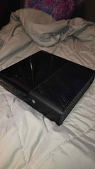 Microsoft Xbox 360 E 500GB Console with two controllers and 12 games
