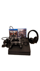 Sony PlayStation 4 Slim 1TB Console – Jet Black including 2 Controllers and More