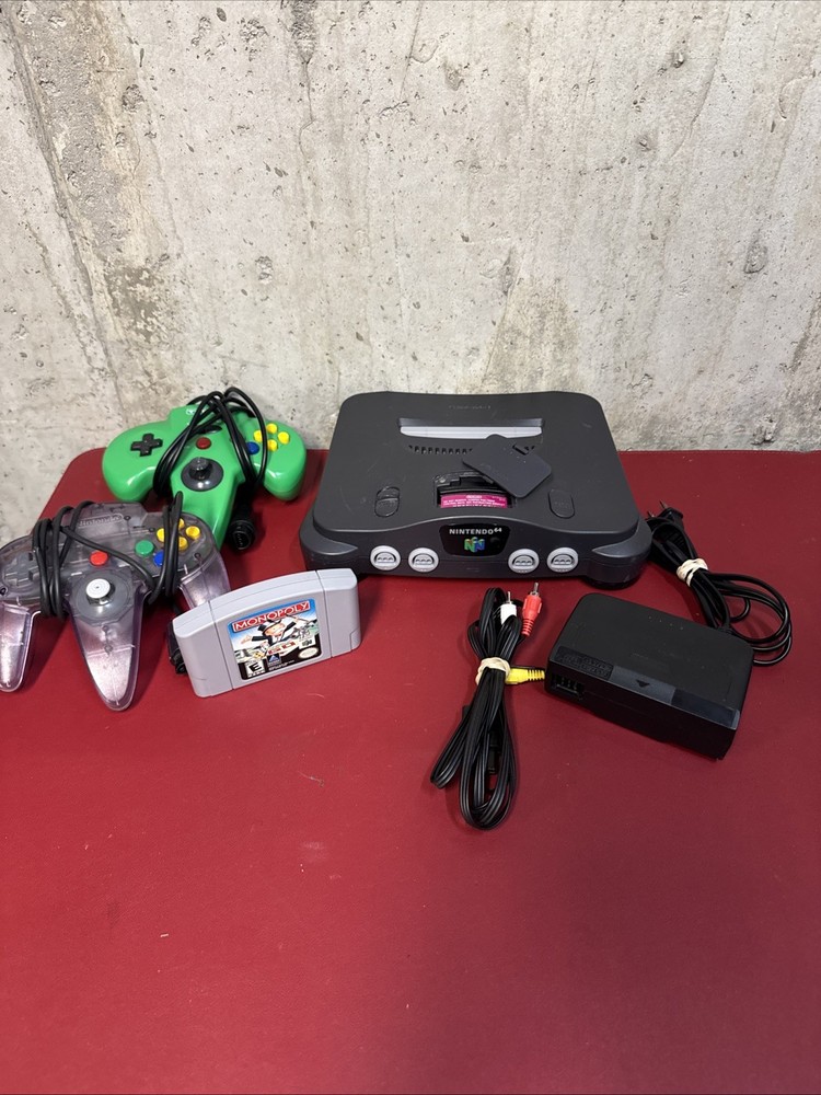 Nintendo 64 Console Bundle w/ 2 Controllers, power and AV cords.tested & working