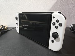 Nintendo – Switch OLED Handheld Console – 64GB Model *HOT BUNDLE*