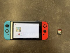 NINTENDO SWITCH WITH NEON BLUE , AND NEON RED JOY-CON MODEL: HAC-001(-01)