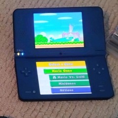 Nintendo DSI XL Blue no charger or stylus super Mario Bros DS game included read