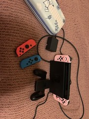 Nintendo Switch 32GB Handheld Console – Neon Red/Neon Blue
