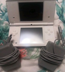 Nintendo DS With 2 Charger Cables, Earphones With Volume Control And Cars Game