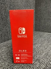 New Nintendo Switch OLED Console Gaming System HEG-001 Black/White Bundle