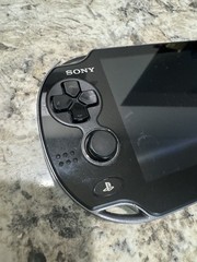 Sony PlayStation Vita – Model PCH-1101 – Black with Charger and 4GB Memory Card