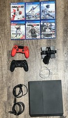 PS4 with 2 controllers, dual controller charger, PS4 Power Adapter, and more