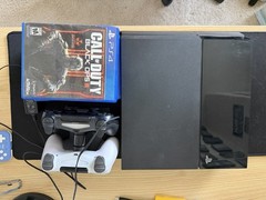 Sony PS4 1TB Console + 2 DualShock 4 Controllers + Charging Dock + Games