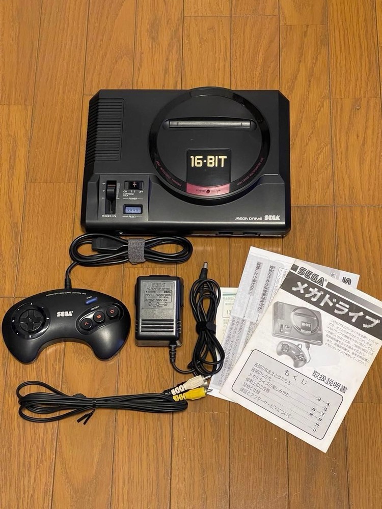 Mega Drive console HAA-2510, working condition, serial number matching.