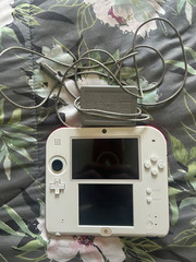Nintendo 2DS red and white, console with charger came with super Mario bros