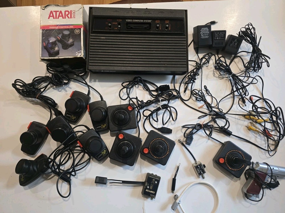 Atari 2600 Console And 27 Games Plus Controllers Lots Of Manuals, Cords Untested