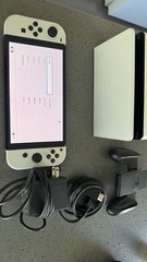 Nintendo Switch White OLED With Accessories, Barley Used And In Very Good Condit