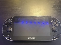 Sony PlayStation Vita 1000 + SD2vita + Charging Dongle + Memory Card + SD Card