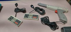 NES Action Bundle Set: 2 Consoles, 2 Controllers, Zapper, Powerpad + Game Genie