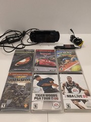 Sony PSP 3001 Black Handheld Console with Charger, Car Adapter, and 5 Games.