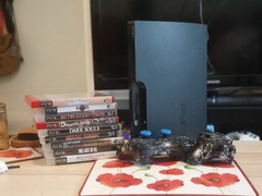 Sony Playstation 3 set: Console, two controllers, nine games