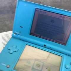 Nintendo DSi Light Blue Handheld Console w/Box, Nintendog, & Instruction Booklet