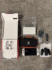Nintendo Switch OLED Handheld Console – 64GB – White With 128GB microSD and case