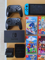 Nintendo Switch Bundle + 2 Pro Controllers + 6 Games + Dock + Case + Accessories