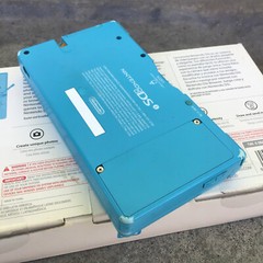 Nintendo DSi Light Blue Handheld Console w/Box, Nintendog, & Instruction Booklet