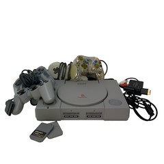 PlayStation System PS1 Bundle Cords 4 DualShock Controllers 2 Memory Cards